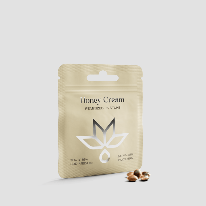 Honey Cream feminized seeds packet with cannabis seeds on a light background